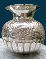Small chiseled vase bathed in Silver